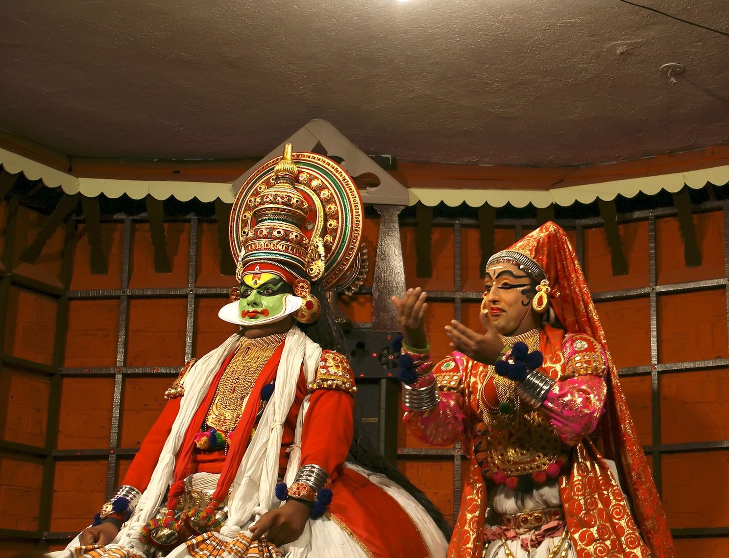 FORT COCHIN - MARCH 06: Kathakali performer in the virtuous pachcha (green) role in Cochin Kathakali Center on March 06, 2011 in South India. Kathakali is the ancient classical dance form of Kerala.