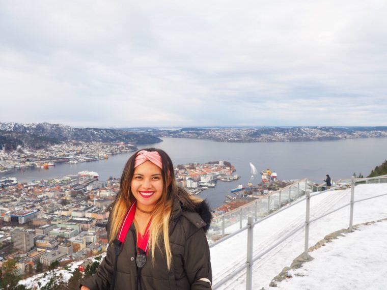 Kach in winter clothing with a beautiful view