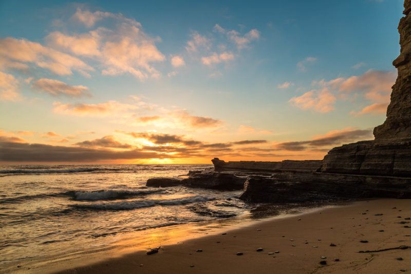 Beautiful orange sunset by the beach