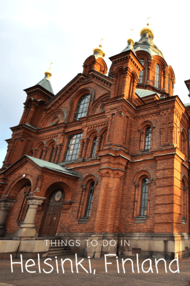 A big red-brick building with gold domes