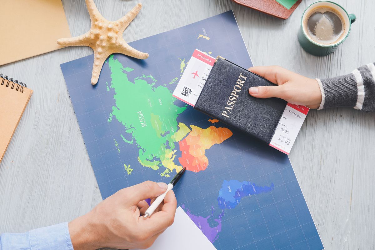 Colorful map and passport on a table