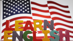 The American flag next to the words Learn English