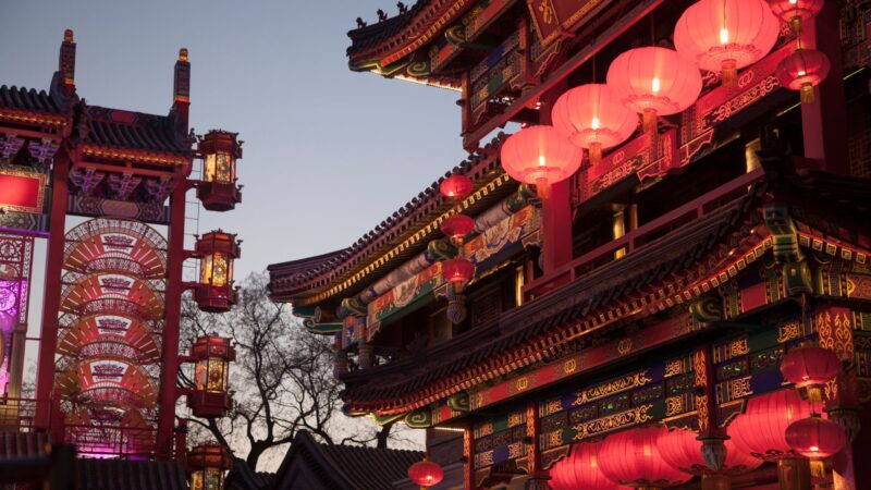 Red lanterns hanging at a Chinese temple entrance