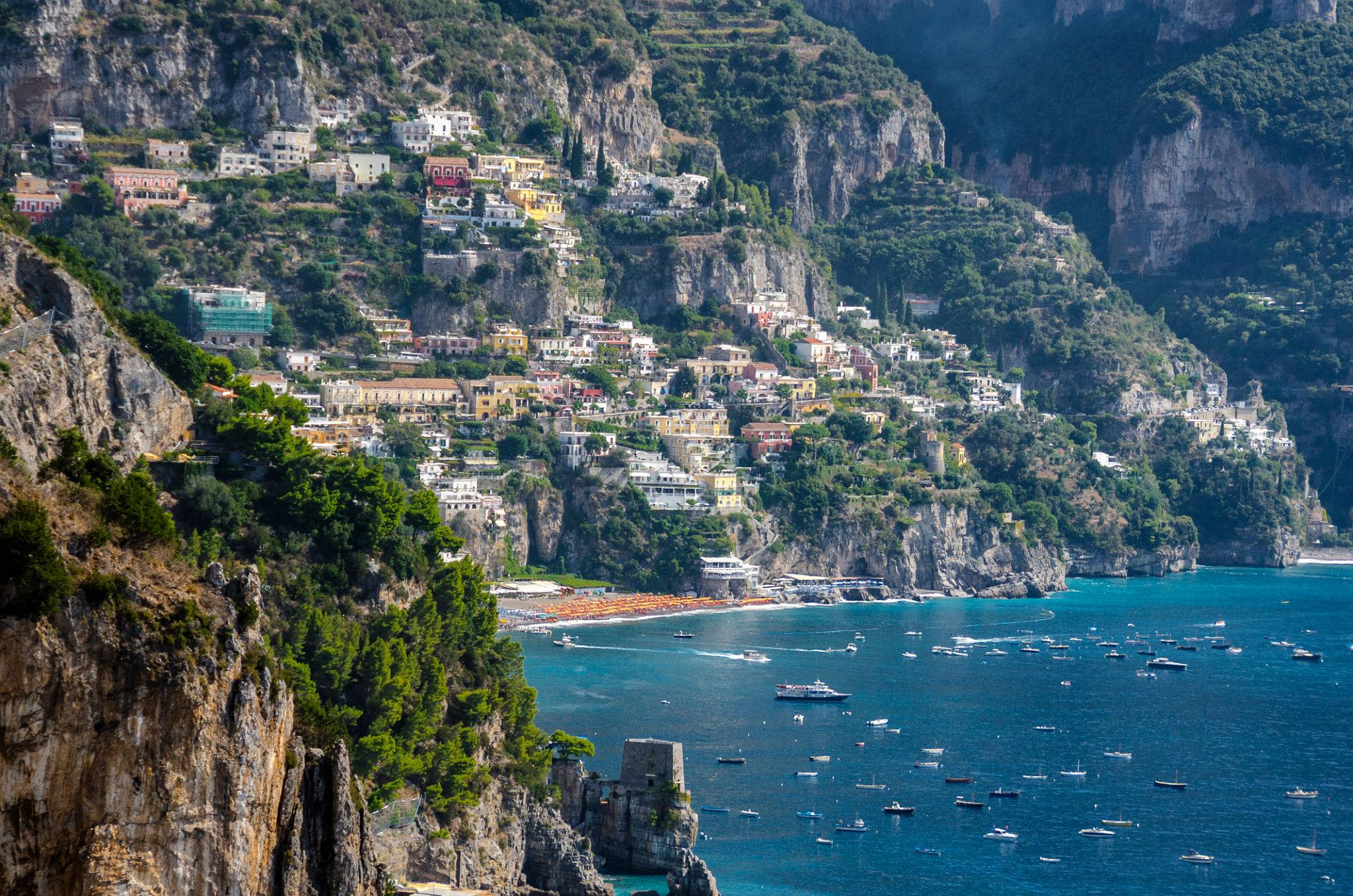 Amalfi Coast on a beautiful sunny day overlooking the ocean with boats